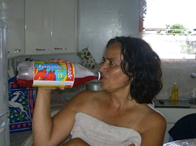 Maria Fernandes drinking a Fernandes